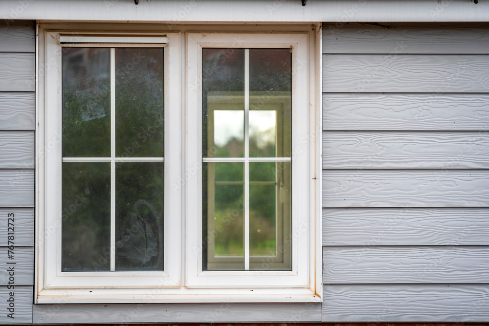 Fototapeta premium Window view of construction building site in england uk.