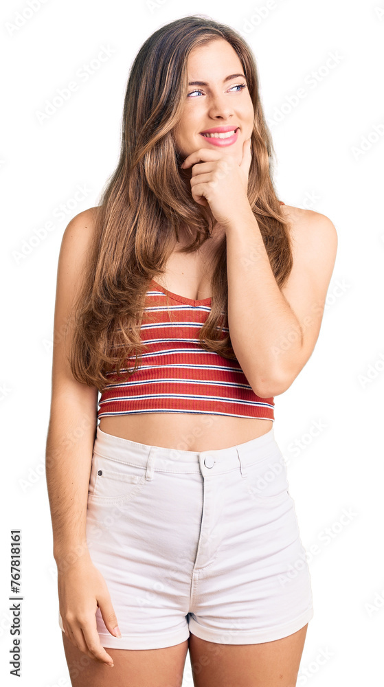 Beautiful caucasian young woman wearing casual clothes with hand on chin thinking about question, pensive expression. smiling with thoughtful face. doubt concept. Beautiful caucasian young woman wearing casual clothes with hand on chin thinking about question, pensive expression. smiling with thoughtful face. doubt concept.