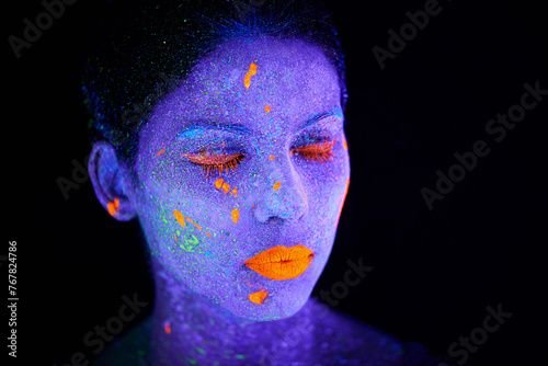 Face  neon and psychedelic glitter for creative  art and paint with unique surreal glow. Person  science fiction and color with dream  rave and abstract uv illusion for mystical fluorescent trance