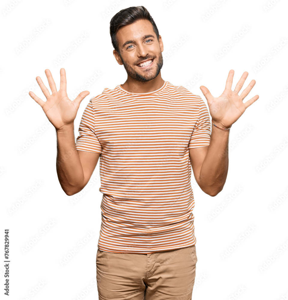 Handsome hispanic man wearing casual clothes showing and pointing up with fingers number ten while smiling confident and happy. Handsome hispanic man wearing casual clothes showing and pointing up with fingers number ten while smiling confident and happy.