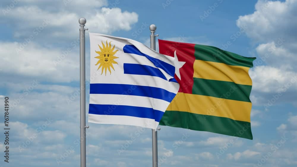 Togo, Togolese Republic and Uruguay two flags waving together, looped video, two country cooperation concept Togo, Togolese Republic and Uruguay two flags waving together, looped video, two country cooperation concept
