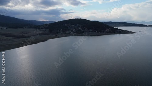 Drone shot of Batak Reservoir Lake in the Rhodope Mountains in the Batak municipality, Bulgaria photo