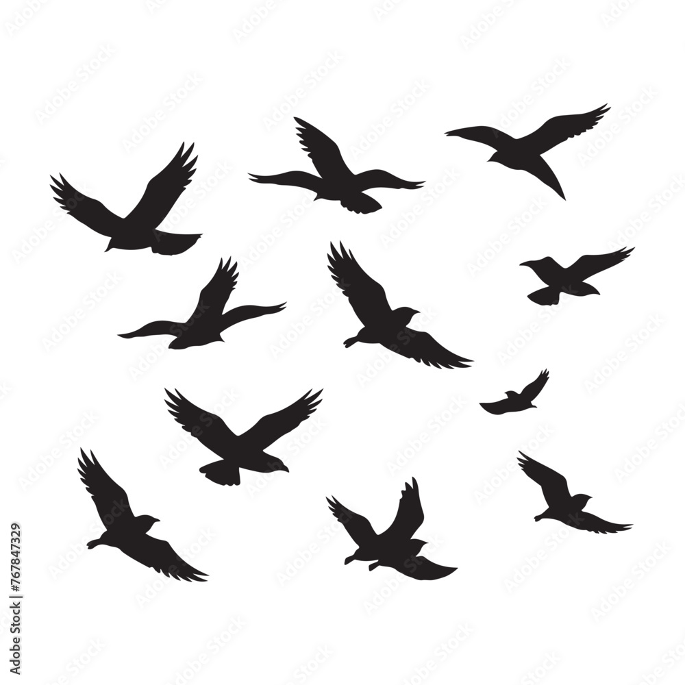 Flock of birds in flight over water silhouette Flock of birds in flight over water silhouette