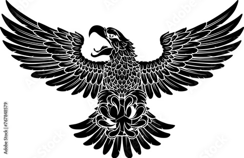 A bald eagle or hawk flying with a soccer football ball in their claws sports mascot