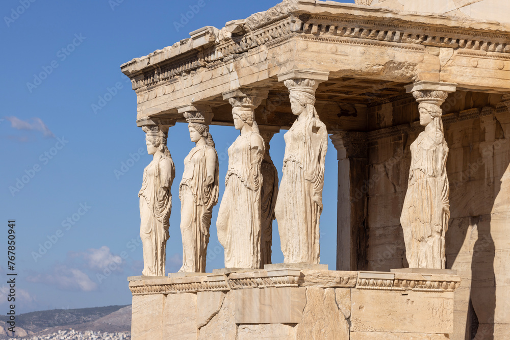 Obraz premium Erechtheion, Temple of Athena Polias on Acropolis of Athens, Greece. View of The Porch of Maidens with statues of caryatids