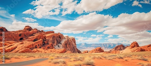 Valley of Fire State Park against a bright blue  cloudy sky