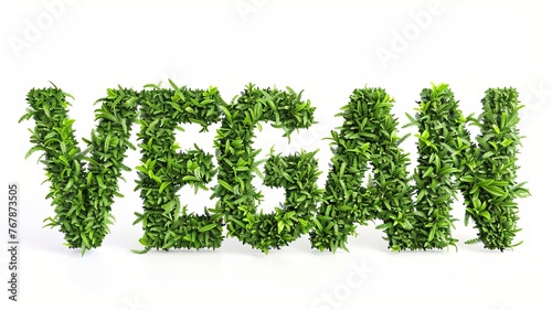 word vegan written in grass and leaves