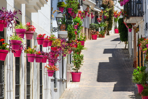 Street with pots in in Estepona, Andalusia, Spain, Europe