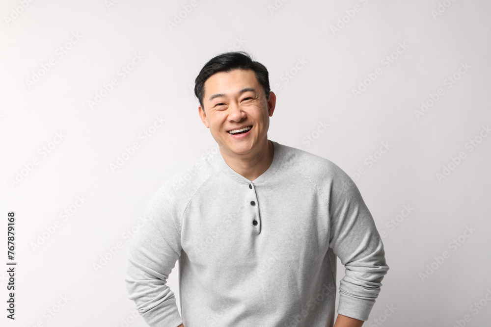 Portrait of happy man on light background Portrait of happy man on light background
