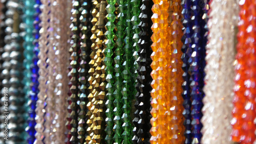 Colorful decorative pearl chains displayed in a shop