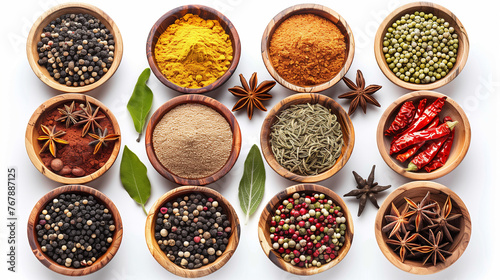 Various spices on kitchen table on white background