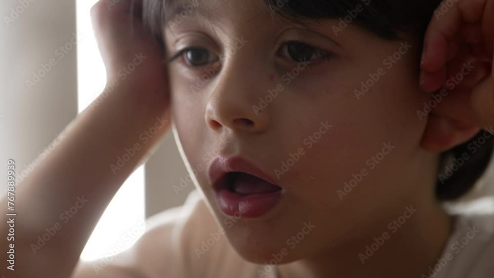 Lazy Drowsy Youngster in Deep Thought, Close-Up of Bored Little Boy Pondering. Close-up face of bored male caucasian kid Lazy Drowsy Youngster in Deep Thought, Close-Up of Bored Little Boy Pondering. Close-up face of bored male caucasian kid