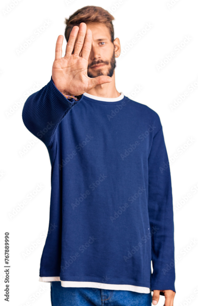 Handsome blond man with beard wearing casual sweater doing stop sing with palm of the hand. warning expression with negative and serious gesture on the face. Handsome blond man with beard wearing casual sweater doing stop sing with palm of the hand. warning expression with negative and serious gesture on the face.