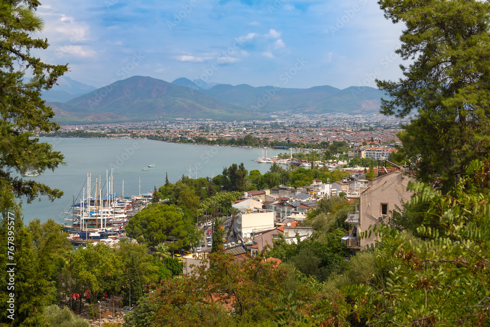 Turkey, Fethiye, city view, harbor with numerous yachts, beautiful mountains.