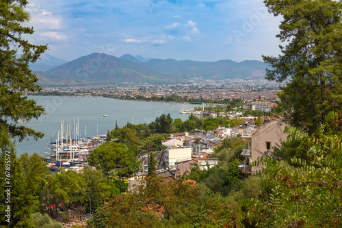Turkey, Fethiye, city view, harbor with numerous yachts, beautiful mountains.