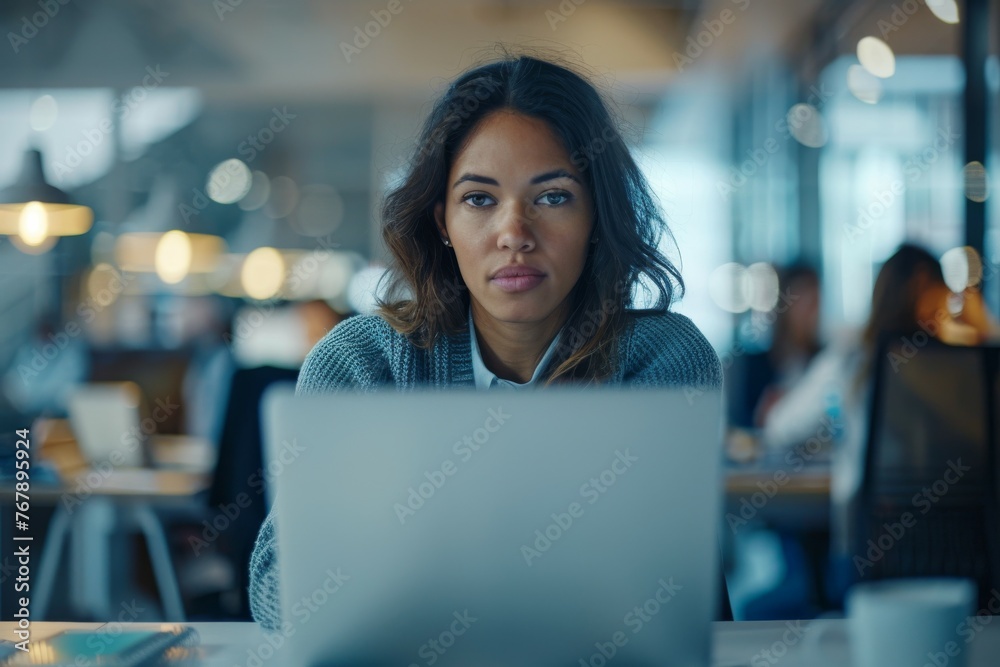 Woman with laptop in office at work Woman with laptop in office at work