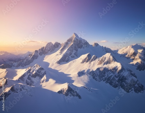 Landscape photo of snowy mountains at sunset