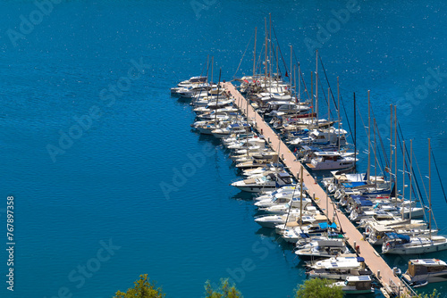 Close-up of a marina with yachts near Kas in Turkey on a sunny bright day.