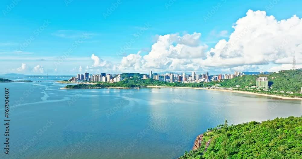Aerial photography of city skyline with ocean and mountain landscape in Zhuhai Aerial photography of city skyline with ocean and mountain landscape in Zhuhai