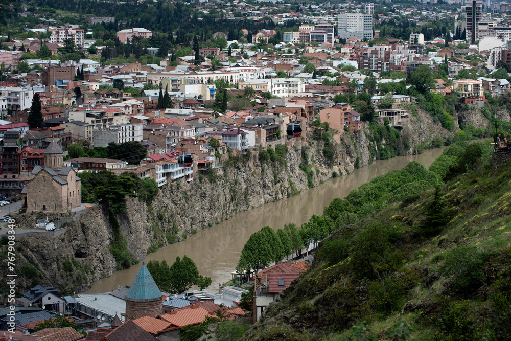 Aerial view of Tbilisi, capital of the Republic of Georgia and the cliffs of the Kura River.