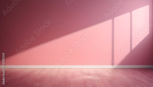 Beautiful original background image of an empty space in pink tones with a play of light and shadow on the wall and floor for design or creative work.