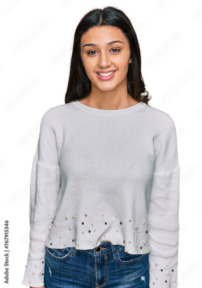 Young hispanic girl wearing casual clothes with a happy and cool smile on face. lucky person. Young hispanic girl wearing casual clothes with a happy and cool smile on face. lucky person.