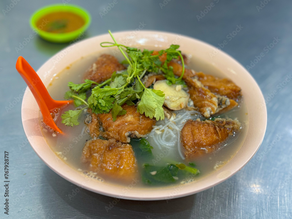 rice noodles fish soup in bowl rice noodles fish soup in bowl