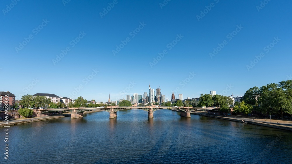 Ignatz Bubis Bridge over River Main on a sunny day at Frankfurt, Germany