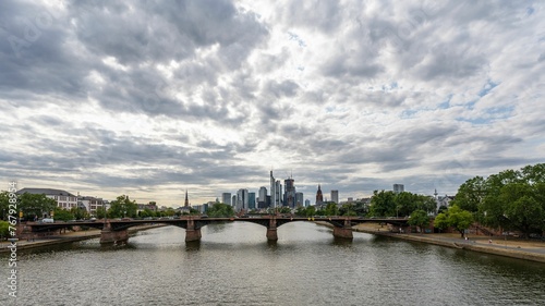Ignatz Bubis Bridge over River Main against the cloudy sky at Frankfurt, Germany photo