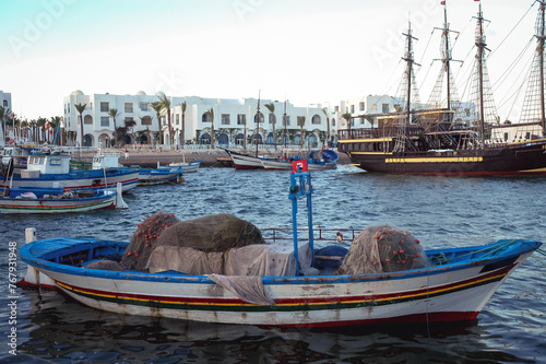 Fishing boat in port of Houmt Souk city on Djerba Island, Tunisia photo