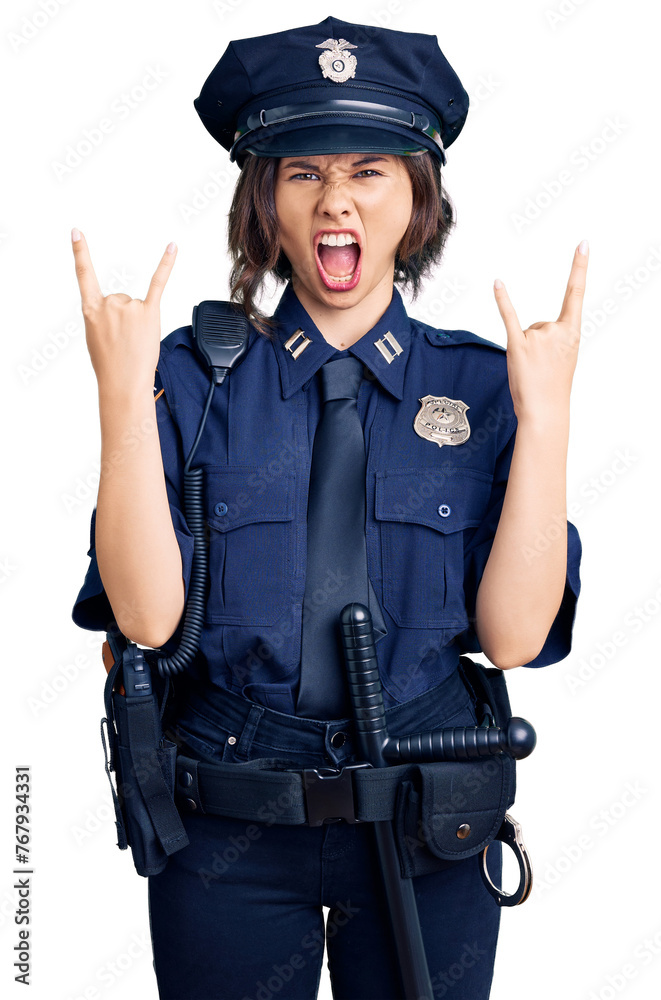 Young beautiful girl wearing police uniform shouting with crazy expression doing rock symbol with hands up. music star. heavy concept. Young beautiful girl wearing police uniform shouting with crazy expression doing rock symbol with hands up. music star. heavy concept.