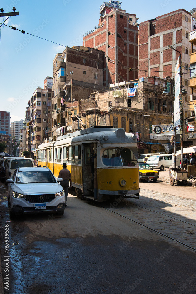 14 06 2023 Alexandria, Egypt, the streets of an ancient African city filled with people and trams. This was on a hot sunny summers day.
