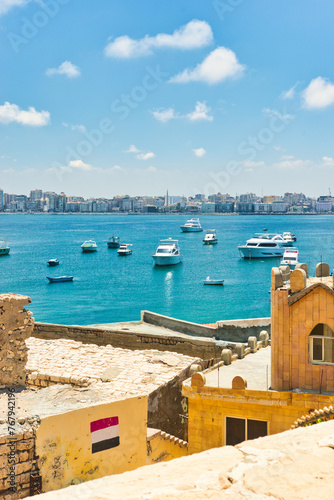 ALEXANDRIA, EGYPT - 14 JUNE 2023 : The Qaitbay Citadel, the famous landmark in Alexandria located by the Mediterranean Sea. This area is believed that it used to be the location of the Pharos. 