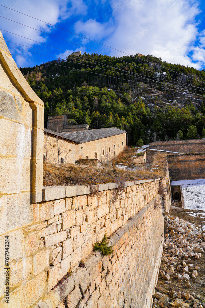 Fortified military building of the Communication Y, built by Vauban across the Fontchristiane Valley between the forts of Three Heads and of Randouillet above Briançon in the French Alps Fortified military building of the Communication Y, built by Vauban across the Fontchristiane Valley between the forts of Three Heads and of Randouillet above Briançon in the French Alps