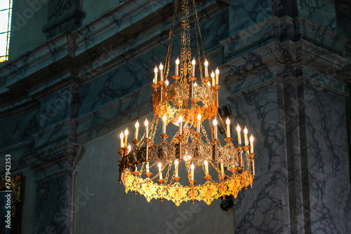 Gilded chandelier in the Collegiate Church of Our Lady and Saint Nicholas of BrianÃ§on in the fortified old town built by Vauban in the French Alps