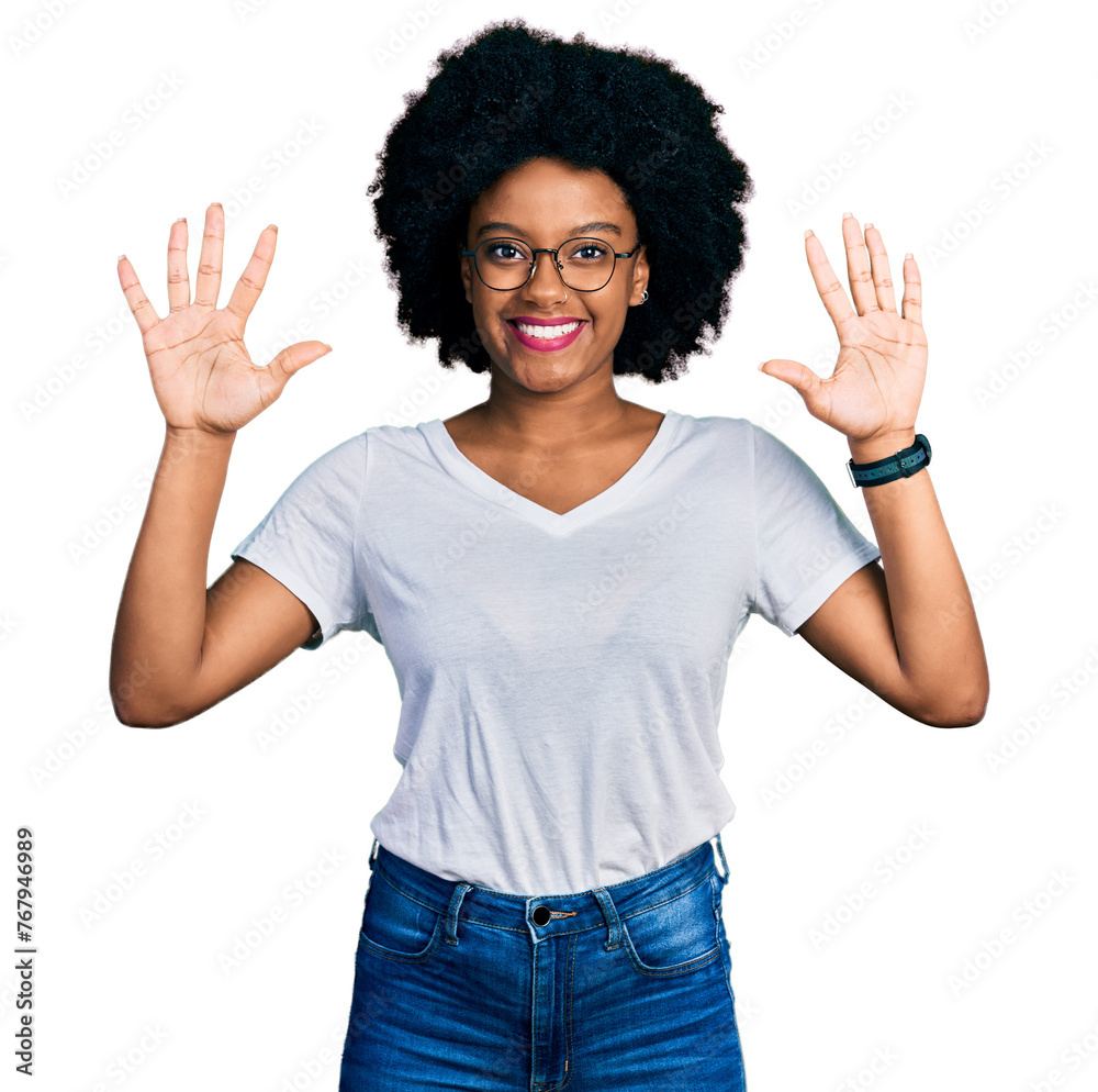 Young african american woman wearing casual white t shirt showing and pointing up with fingers number ten while smiling confident and happy.