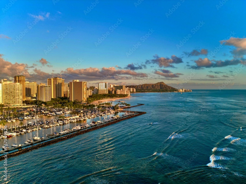 View of a vibrant cityscape of Diamond Head Sunset, Waikiki, Hawai'i