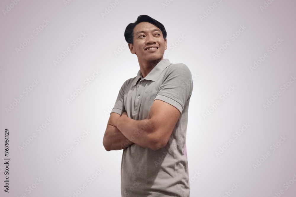 young asian handsome man smiling, enjoying life, feeling happy, friendly, satisfied and to insert an ad. Copy space image. young asian handsome man smiling, enjoying life, feeling happy, friendly, satisfied and to insert an ad. Copy space image.