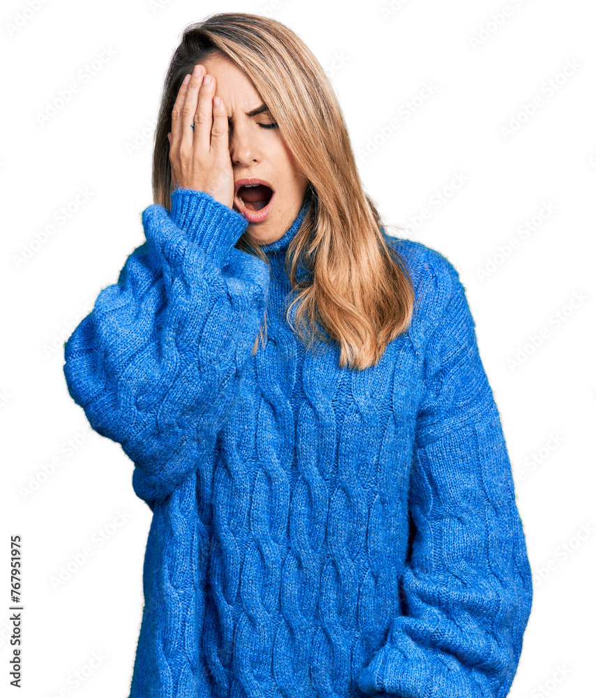 Young blonde woman wearing casual sweater yawning tired covering half face, eye and mouth with hand. face hurts in pain. Young blonde woman wearing casual sweater yawning tired covering half face, eye and mouth with hand. face hurts in pain.