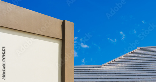 Exterior building concrete wall frame and line gray ceramic rooftop against blue sky daylight  background well shape minimal, Material free space for text present  © Nature Peaceful 