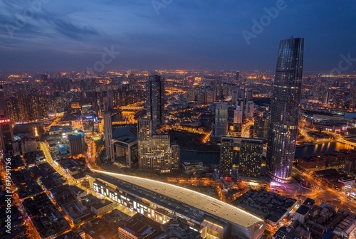 Cityspace of Tianjin with its beautiful skyscrapers during the sunset in the evening in China