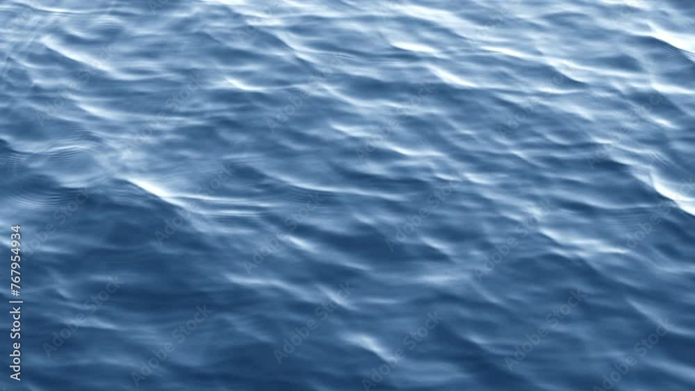 blue water surface with small waves background blue water surface with small waves background