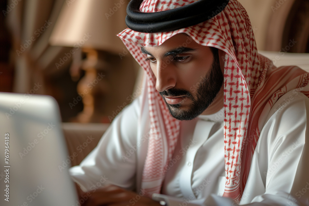 Pensive CEO solving problem on business trip closeup. Focused Arab typing laptop Pensive CEO solving problem on business trip closeup. Focused Arab typing laptop
