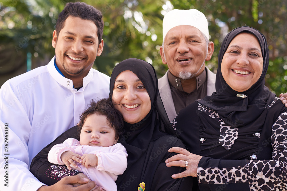 Park, muslim and portrait of family with child for bonding, ramadan and outdoors together. Islam, happy people and grandparents with newborn infant for love, childcare and support in nature or garden Park, muslim and portrait of family with child for bonding, ramadan and outdoors together. Islam, happy people and grandparents with newborn infant for love, childcare and support in nature or garden