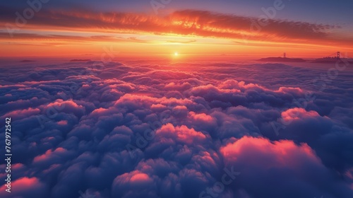 Sun Setting Over Clouds