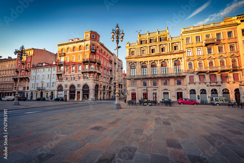 Attractive summer cityscape of Trieste, Italy, Europe. Splendid morning view of Piazza del Ponte rosso Town square. Traveling concept background.