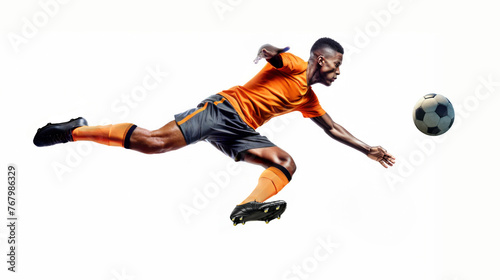 Football Player Strikes Ball Midair on White Background photo