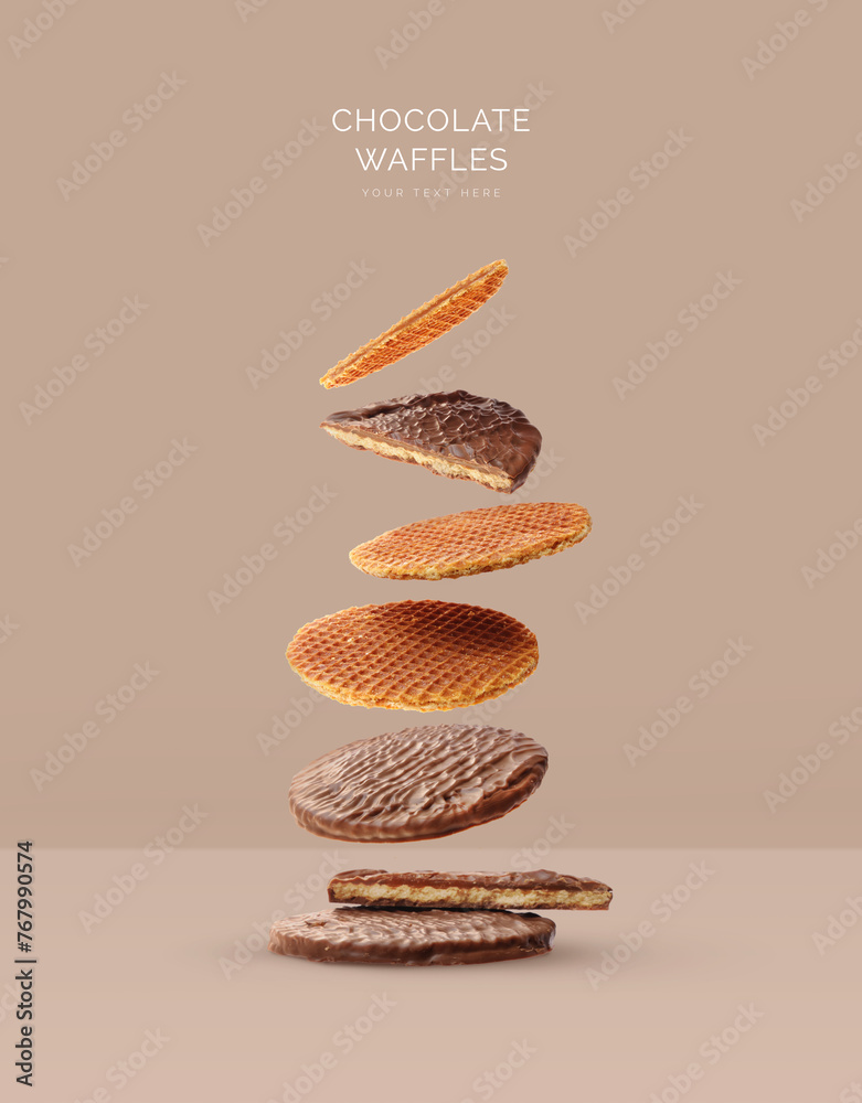Creative layout made of chocolate stroopwafel on beige background. Flat lay. Food concept. Macro  concept. - obrazy, fototapety, plakaty 