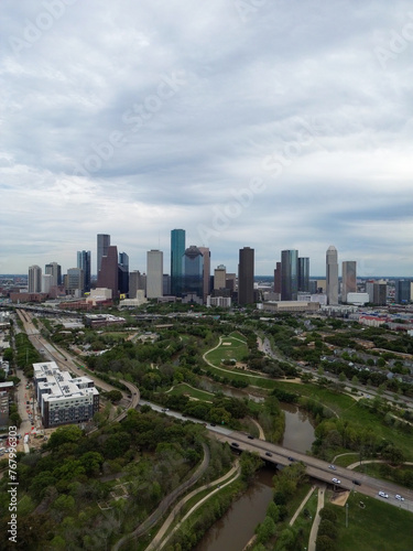 Downtown Houston  Texas skyline with traffic in the background on a busy freeway