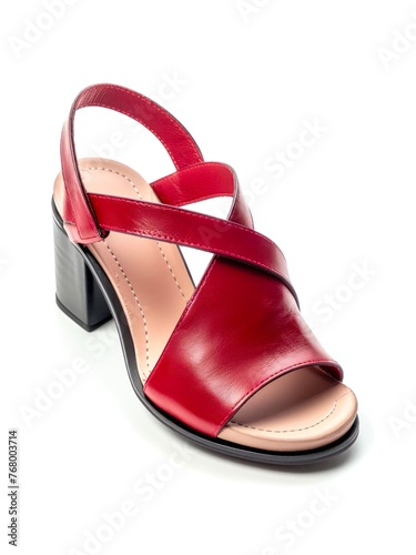 Red leather summer female shoe with medium heel isolated on white background.
